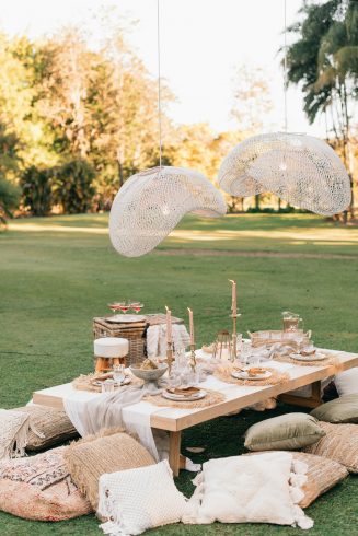 tipi weddings can also feature beautiful picnic settings like the one in this image.