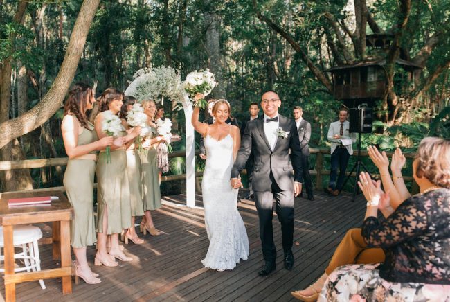 A bride and groom celebrate their wedding at The Acre