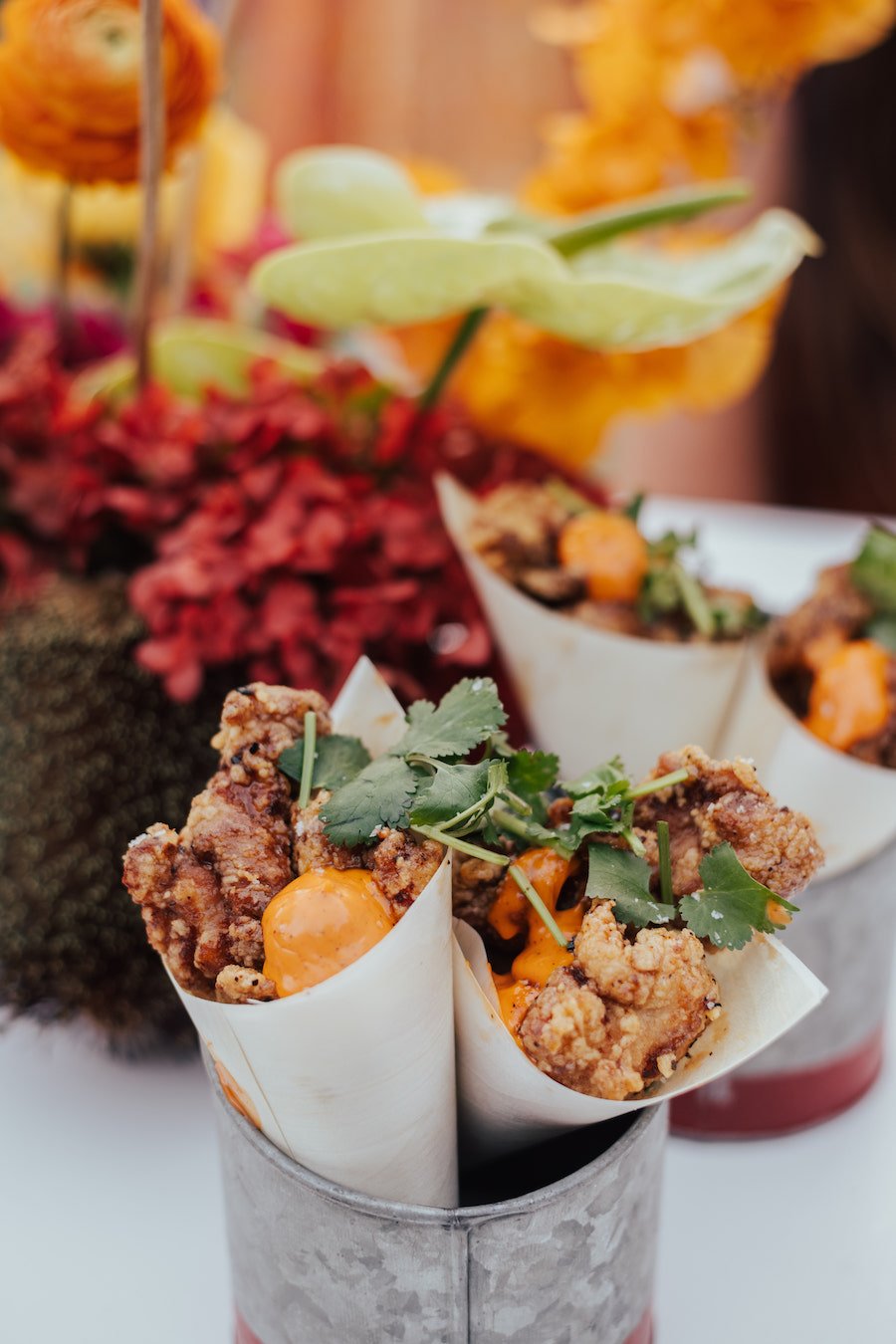 mexican wedding menu with cones of popcorn chicken