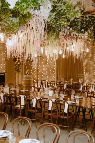 wedding reception flowers set up