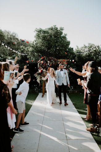 bride and groom just married in garden ceremony