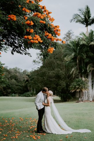 A bride and groom at one of the many photo locations at the acre