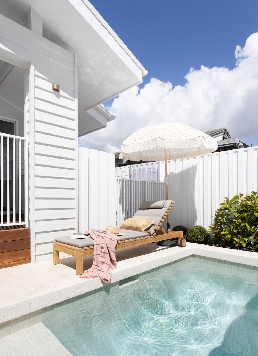 Gold Coast wedding accommodation pool and deck chair in sun