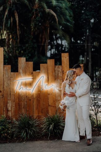 the acre with bride and groom