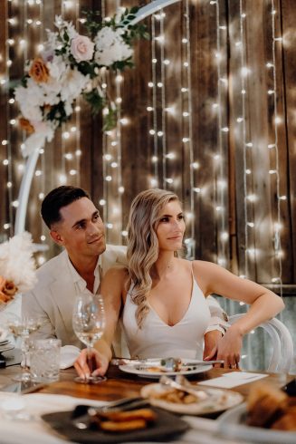 bride and groom at barn wedding