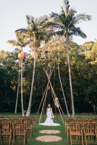 Bride under tipi arbour