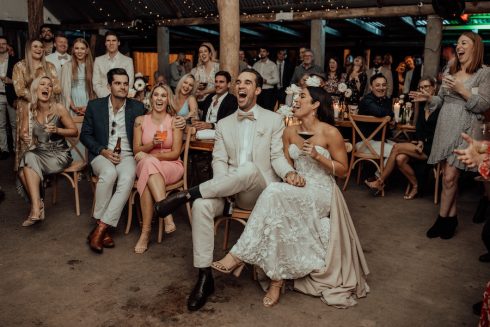 Bride sitting with cocktails