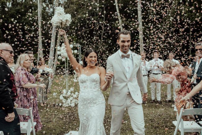 Bride + groom + confetti